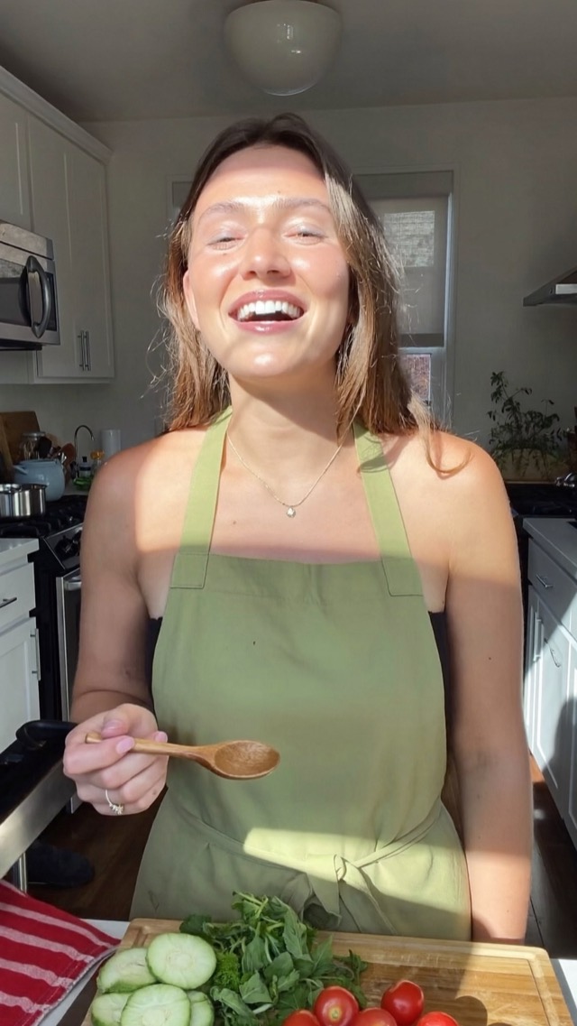 A cook talking to camera in a sunny kitchen, with a timer popping in and captions
